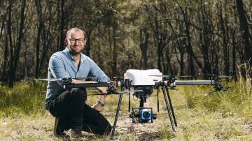 Ninox Robotics founder Marcus Ehrlich with a drone like the one used in the trial. picture supplied