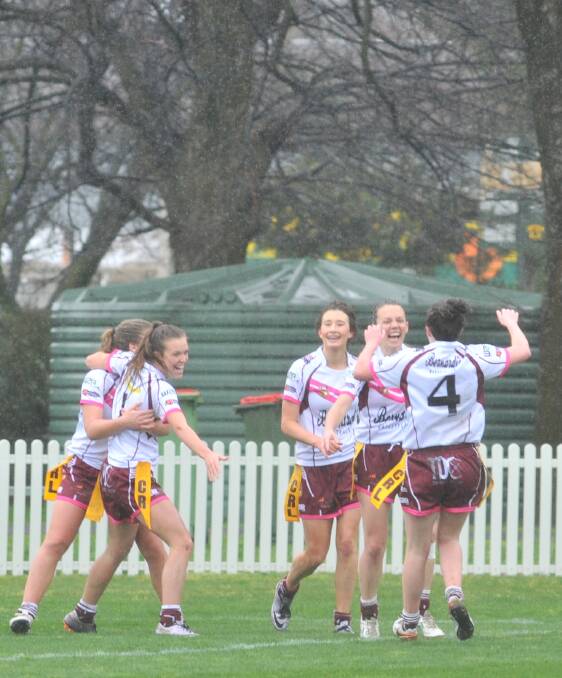 KEY MOMENT: The Blaynery Bears league tag players rush to congratulate Sophie Stammers after her pivotal try in Sunday's grand final. Photo: JUDE KEOGH 0918jktag10