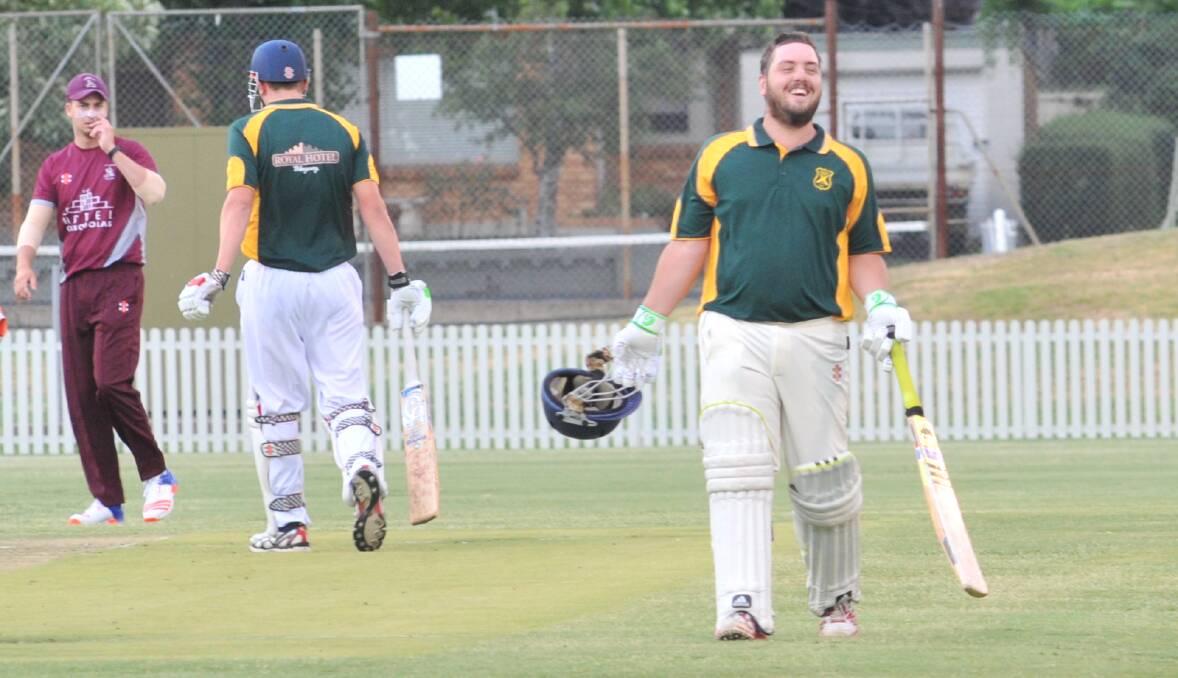 NO LAUGHING MATTER: Blayney's marquee player Mick Curtale shares a joke with the Cavaliers fieldsman during his side's Royal Hotel Cup loss on Friday. Photo: JUDE KEOGH 0113jkcrick3