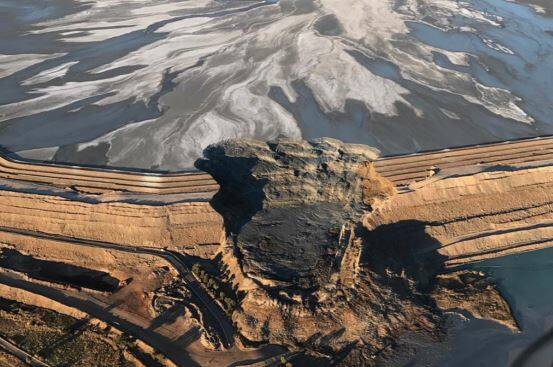 THE DAMAGE: An aerial view of the collapsed wall between Cadia Valley Operations' two tailings dams. Photo: NEWCREST