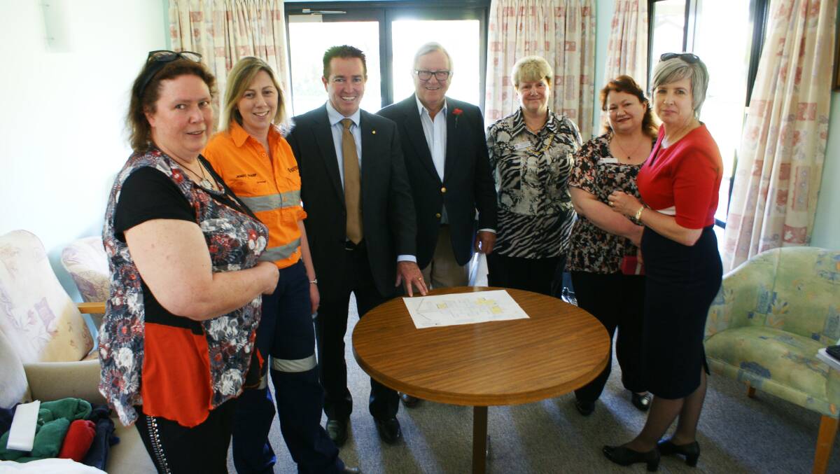 Deborah Higgs, Jenny Sharp, Paul Toole, Miles Hedge, Kathy Hillier, Ruth Jones and Rebecca Ryan in the room that will become part of the new palliative care room.