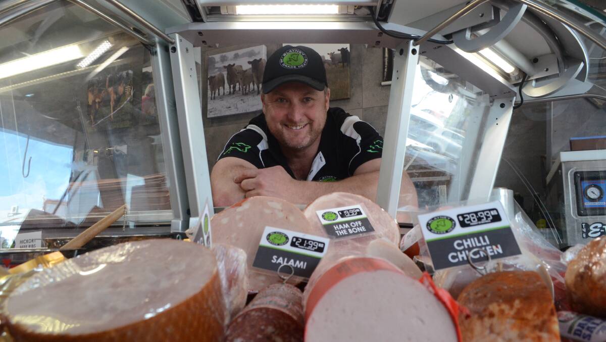 Slicing it up: Cameron Cassel at Hi-Grade Meats with his new deli selection. Photo: Mark Logan.