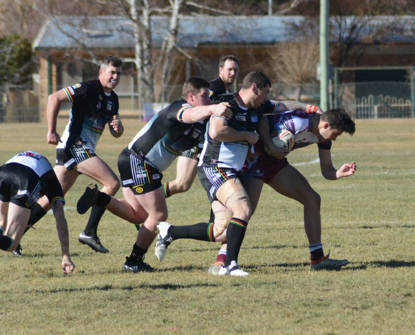 Cut short: Blayney Bears under 18s player Joey Hobby was dragged down by the Panthers defence during last Sunday's group 10 rugby league first division match. Photo: Mark Logan.