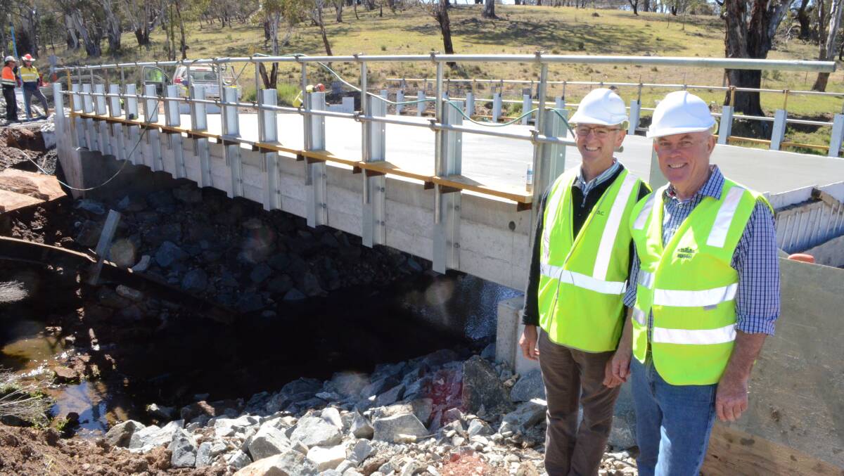 Scott Ferguson and David Somervaille at the site of the new bridge over Evan's Plains Creek.