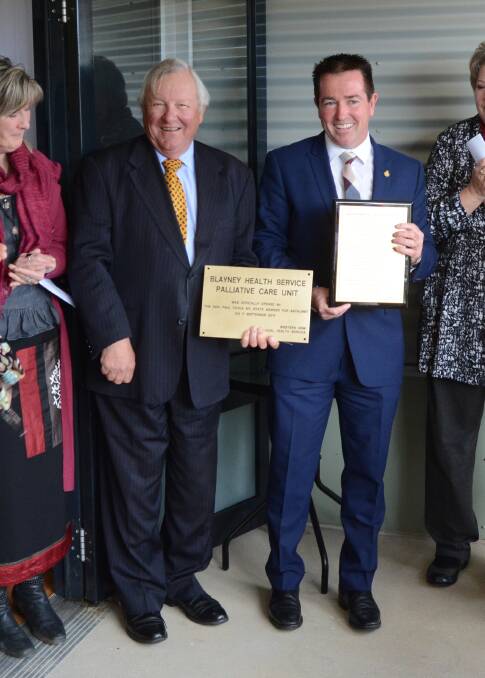 Fundraising: Miles Hedge with Paul Toole during the opening of the Palliative Care room at Blayney Hospital.