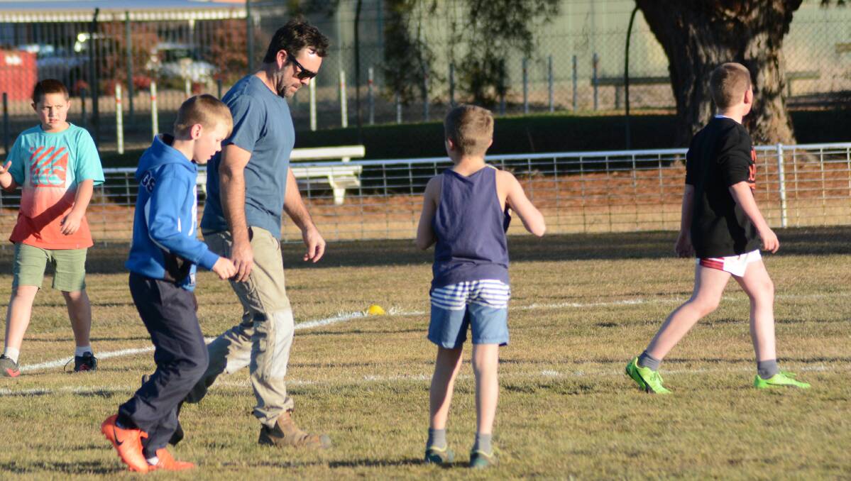 Dad power: James McCann has been coaching his son's rugby league side at King George Oval for the past four years. Photo: Mark Logan