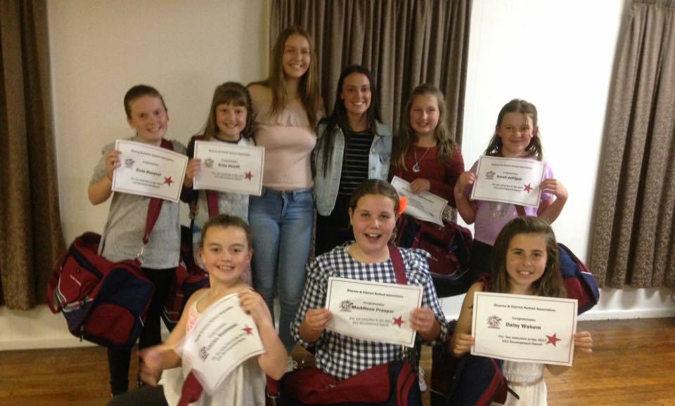 Under 11s development side 2017 proudly showing off their certificates and bags presented to them on presentation night.