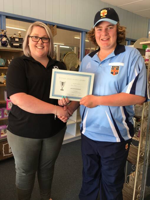 Bi-monthly winner: Zac Farr was presented with his award for excellence in lawn bowls by Natasha Kearney from Blayney Newsagency. Photo: Contributed.
