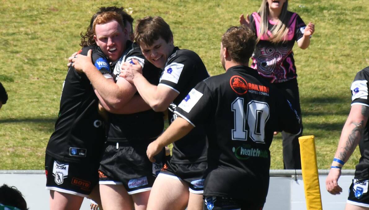 Cowra Magpies players celebrate a try during the 2023 reserve grade grand final against Dubbo CYMS. Picture by Amy McIntyre