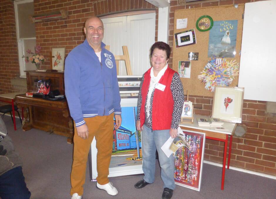 SPECIAL GUEST: Artist and author Dean Mobbs with garden club member Roslyn MacRae.