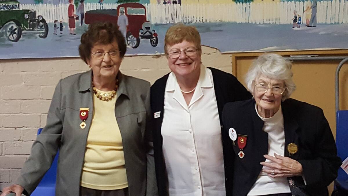 AMAZING ACHIEVEMENT: Veronica McKellar (left) and Yvonne Brown (Right) were recognised for 60 years’ service to Australian Red Cross. Pictured with June Hutchison.