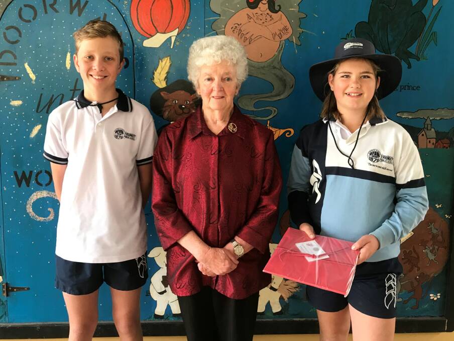Blayney Inner Wheel member, Decima Cone with the captains of Trunkey Creek Public School, Toby and Alycia. Photo: Contributed