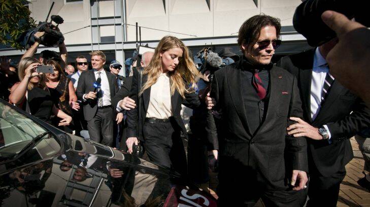 1.4.2016 . Getty/. Fairfax. Actor Johnny Depp leaving  with his wife Amber Heard from  southport court this afternoon .Photo Robert Shakespeare. 0404507257. Johnny Depp and Amber Heard leave the Southport Magistrates Court on April 18, 2016 Photo: Robert Shakespeare