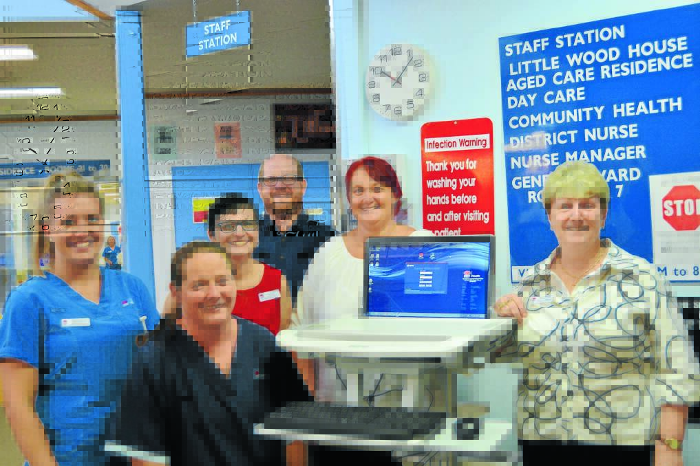 Ashleigh Carroll, Sandra Parker, Mel Harris, Alex Pearson, Kate Wellsted and Kathy Hillier with COW 'Gertie' as a part of the hospital's new record keeping system.