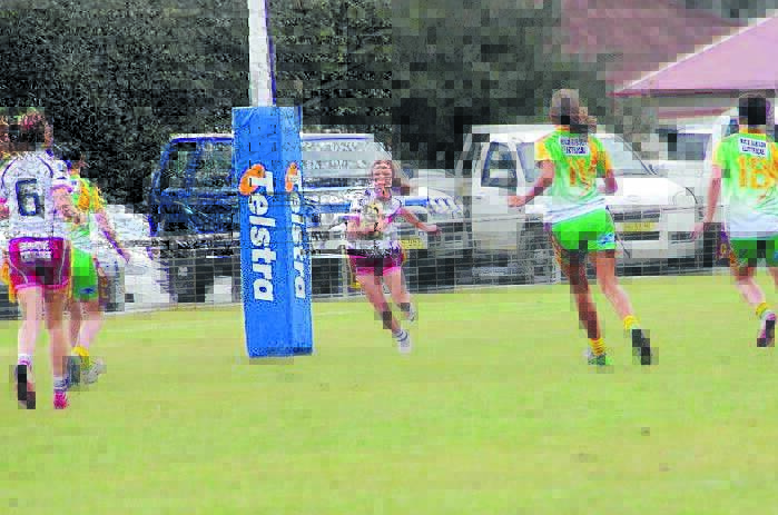 Sophie Stammers takes the ball up in their win against the Orange girls. Photo: Randi Wallace.