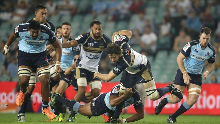 SYDNEY, AUSTRALIA - MARCH 18:  Sam Carter of the Brumbies is tackled during the round four Super Rugby match between the Waratahs and the Brumbies at Allianz Stadium on March 18, 2017 in Sydney, Australia.  (Photo by Mark Kolbe/Getty Images) Photo: Getty Images