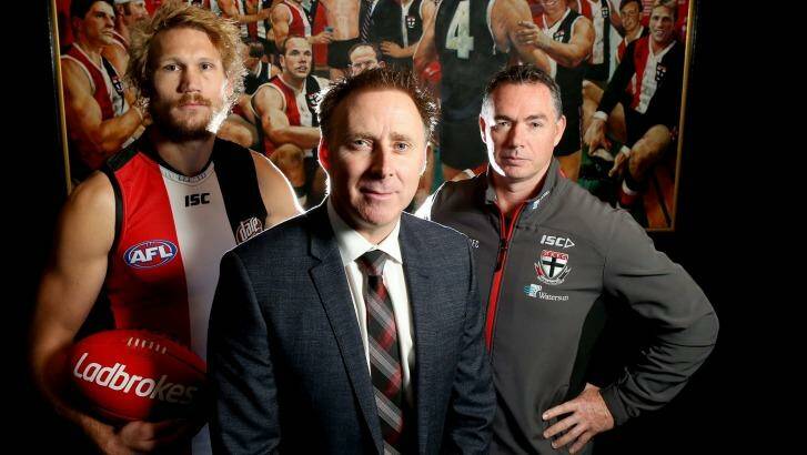 St Kilda footballer Sam Gilbert, CEO Matt Finnis and coach Alan Richardson. The club has become an unlikely champion of gay rights and is lobbying the AFL for the club to hold the league's first Pride Game next season.   Photo: Pat Scala