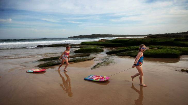 Keeping an eye out: Isla, 5, and Alicia, 6, at Maroubra Beach, where a shark was caught earlier this year. Photo: Fiona Morris
