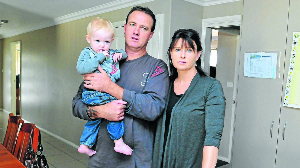ORANGE: Jen Sargent with her husband Brenden and son Brax says she no longer feels comfortable in her north Orange home after she was targeted by thieves. Photo: JUDE KEOGH 0407theft1