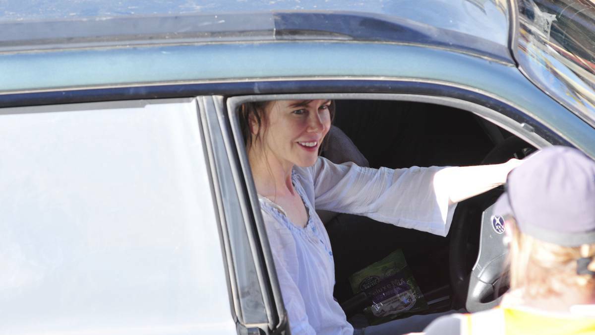 CANOWINDRA: Nicole Kidman, pictured driving a car, was hard at work in Canowindra on Monday, shooting scenes for Strangerland. Photo: JUDE KEOGH