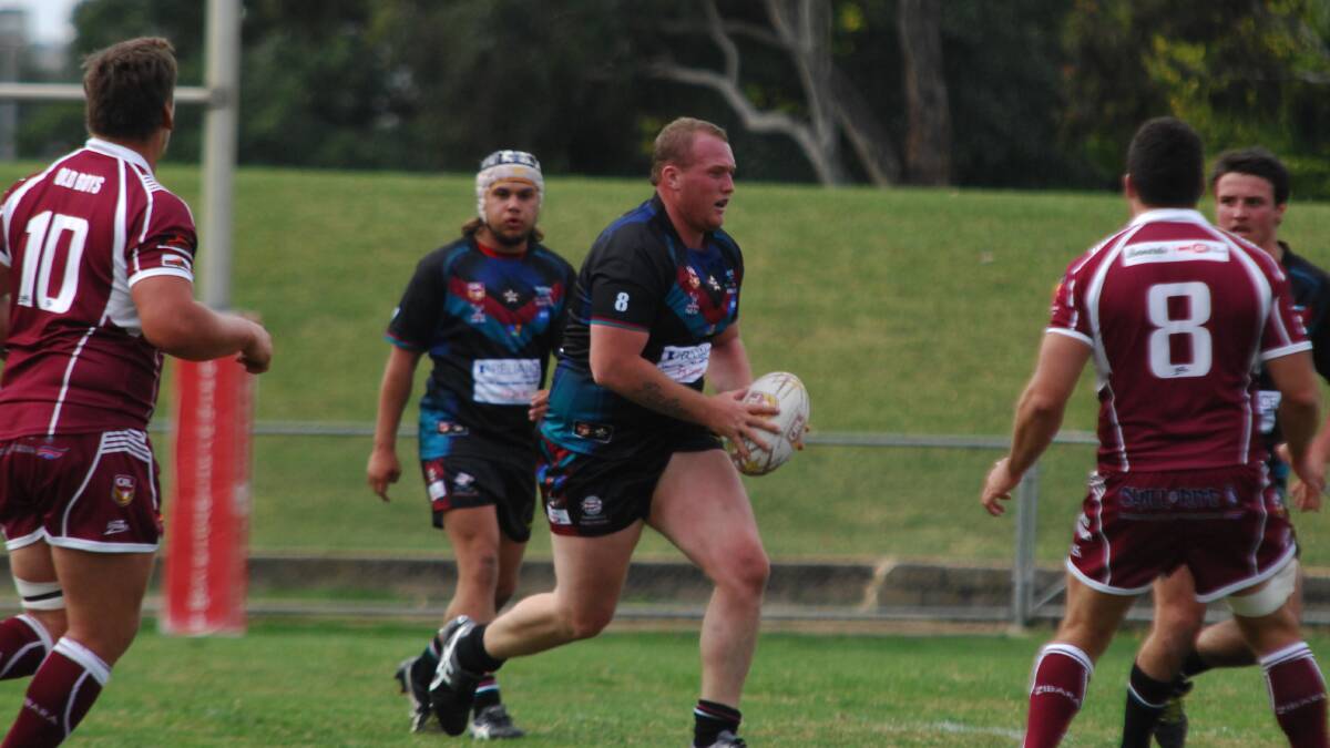 A DAY TO FORGET: Brent Seager brings the ball forward for Bathurst Panthers in yesterday’s 22-44 defeat to the Blayney Bears. Photo: ZENIO LAPKA 	041215zpan1