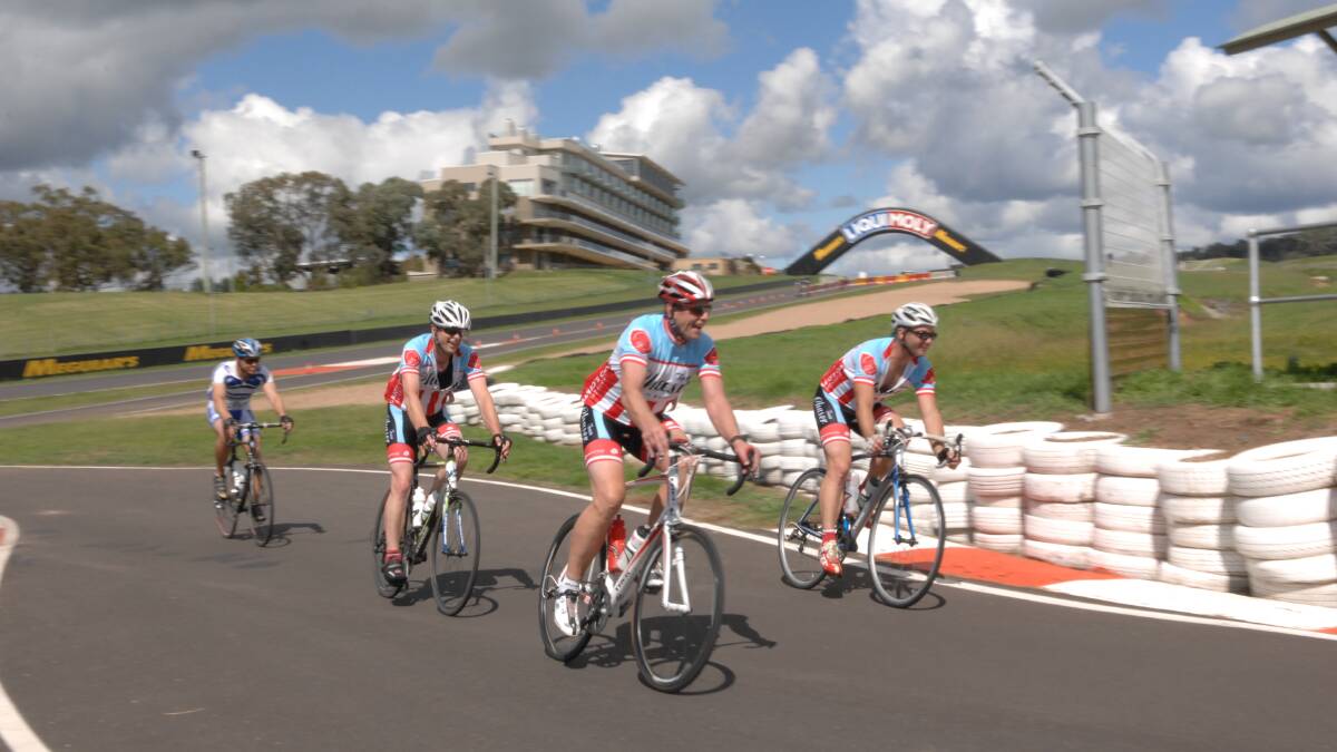 ALMOST THERE: A group of cyclists round the last corner and head for the finish line in Sunday's Blayney to Bathurst Cyclo Sportif 2014. Photo: ZENIO LAPKA