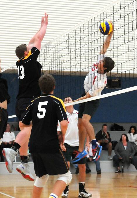 SPIKE: Western's Paris Sylvester looks to score in his team's clash with Riverina yesterday. Photo: STEVE GOSCH 0326sgvolley1