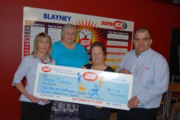 Diabetes Council of Australia Blayney Branch president Kathy Roach and treasurer Molly Avard were presented with a cheque for $4172.26 from Blayney IGA’s Sharon Kinghorne and store manager Geoff Bottom. Photo: Clare Colley.