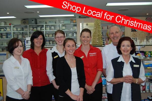 Ready to help you with your Christmas present choices at the Blayney Pharmacy are  Holly-Anne Miskell, Annah Giggins, Sarah Blake, Jessica Orton, Julie Loughlin with Paul and Jude Kevin.