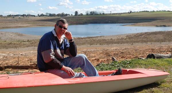 Sailability Western treasurer Timothy Hone wonders if there will ever be enough water in Carcoar Dam for the club’s members to resume sailing. Photo: Brendan Fisher.