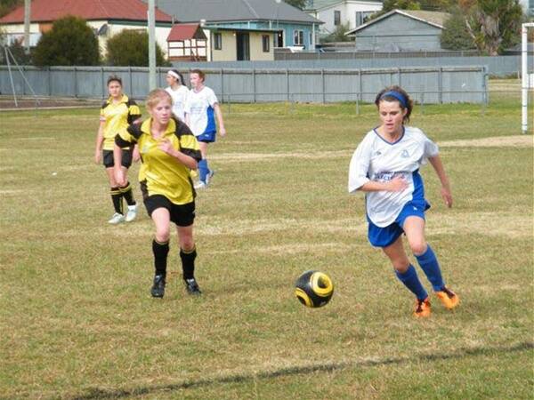 ON THE ATTACK: Millthorpe’s Ashleigh Fiene goes for the ball in her sides 5-0 demolition of Bathurst 75’s.