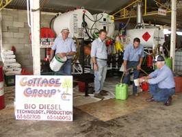 Working their home made bio-deisel distiller are Ed Wilsom, Eric Brown, Michael Spira and Cliff Kearney. Photo Tim Kelly