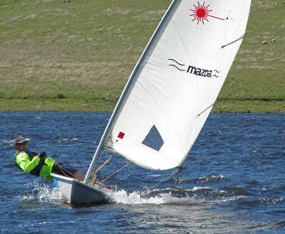 SUPERB SAILING: Mark Fletcher pushing his Laser to the limit on Carcoar dam.
