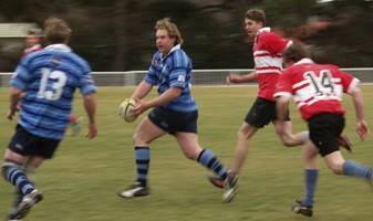 Rams captain Sam Nixon passes to centre Jack Ryan in the Rams second half against Cudal. Photo Tim Kelly