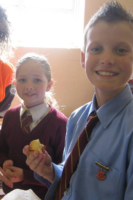 TASTE TESTING: School captains Adelle Hutchings and Benjamin Bell had to sample some of the entries. Tough job!