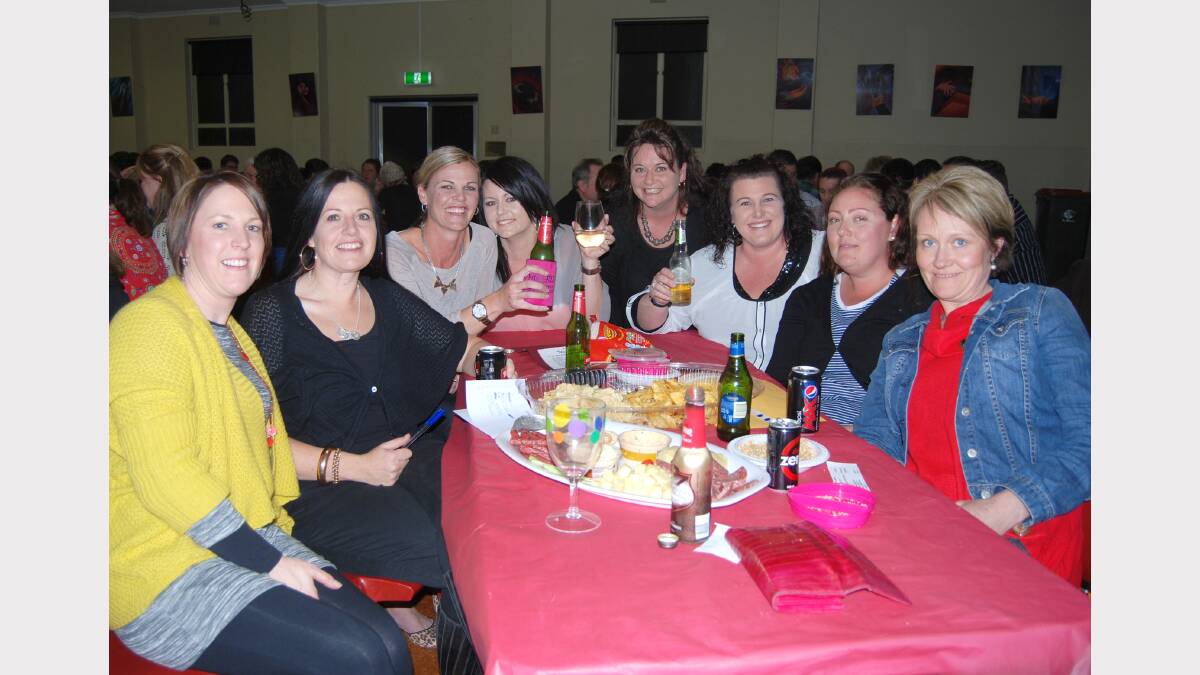 Top of the class. Kristy Buesnel, Erin Jarick, Paige Dickie, Haley Nunn, Trish Farr, Holly Farr, Bianka Bennett and Bec McLoud had all the answers at the trivia night.  Photo: Wayne Cock.