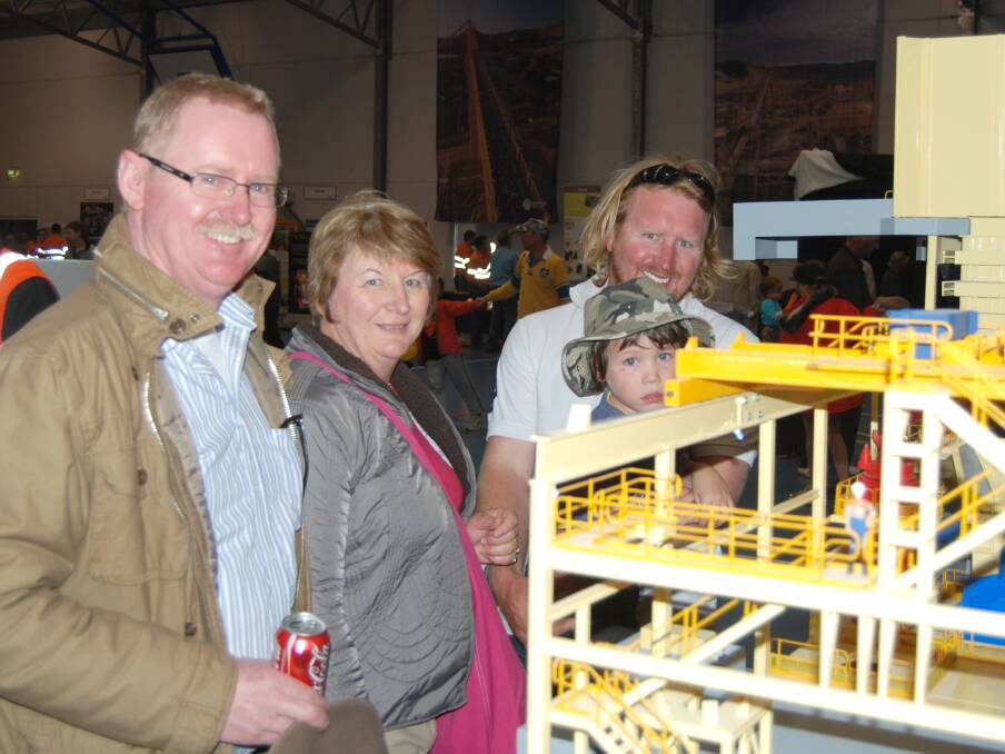 Sam, Jenny, Noah and Dean Symons take in the awesome model of the Cadia East crusher unit.  Photo: Wayne Cock.