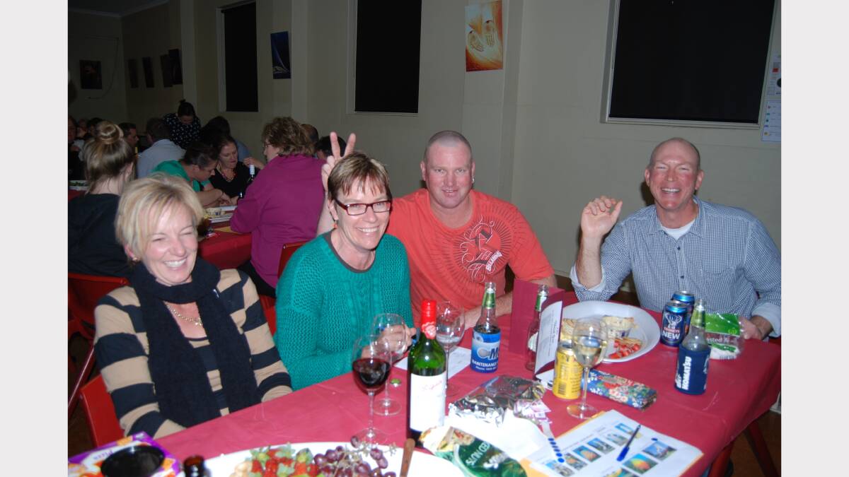  Leisa Saena, Alison Lewis, Cameron Townsend and Matt Lewis were hamming it up at the St. Joseph trivia night on Friday. Photo: Wayne Cock.