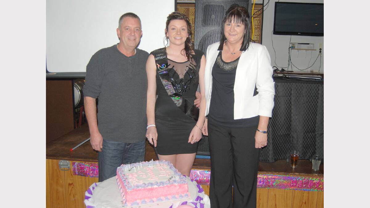 A proud dad and mum, David and Janette Blowes with daughter, Elissa at the Bowling Club on Saturday night for her 21st birthday bash. Photo: Wayne Cock