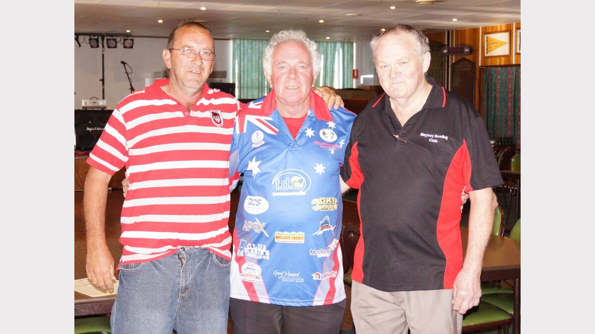 Bowling club representatives, Phil Lees and Skippy Kingham with the pairs tournament winner, Ron Stinson (centre) at the presentation ceremony on Saturday. Photo: Wayne Cock.