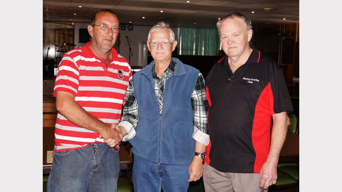 And runner-up, Terry Simmons. Terry came second on points in the pairs matches held over the past four weekends. He is congratulated by Phil Lees and Skippy Kingham.  Photo: Wayne Cock.