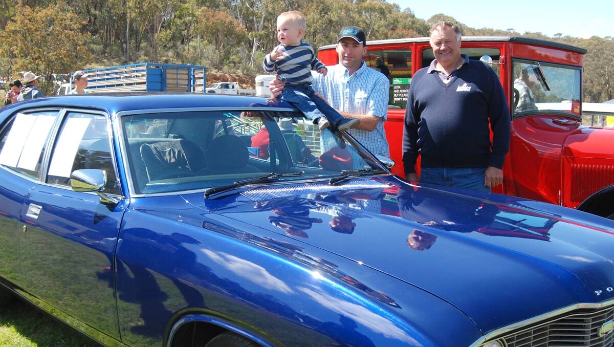 All in the family. Brad Henry (centre) pictured with his son, Jock and father Trevor has lovingly restored his 1972 Ford Fairlane displayed at the Trunkey show. The car was originally purchased brand new by Brad’s grandfather, Claude Henry from McDowell and Mumford in Blayney for $3000. The car has been in the family ever since. 