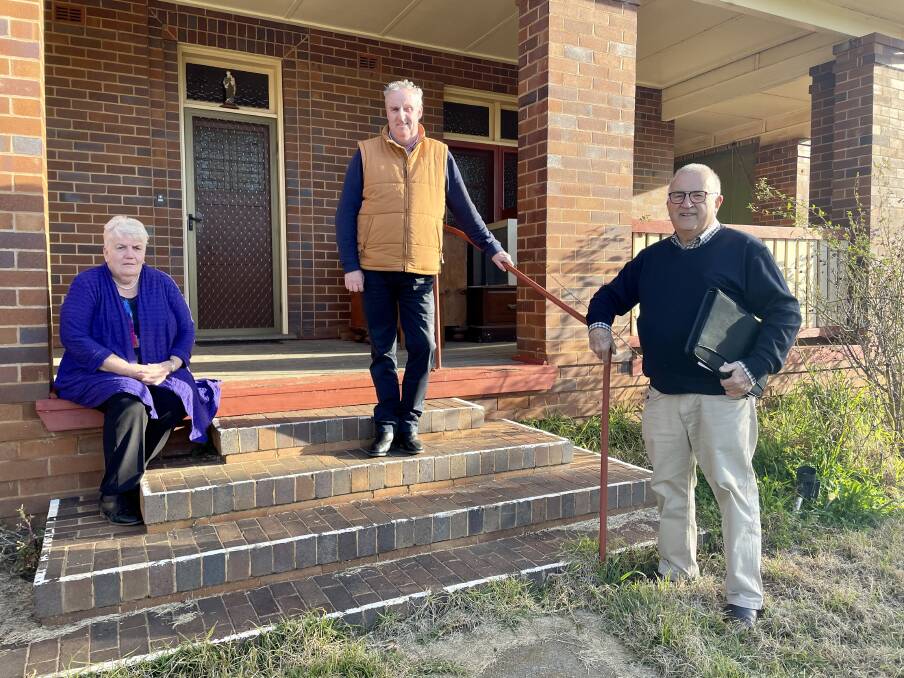 WATCH THIS SPACE: Molong ambassador and 'Big Ma', Mary Mulhall with St Joseph's Primary School principal, Matthew French and parish administration manager, David Cuming at the 1937 convent before it's transformation for incoming Ukrainian families. Photo: EMILY GOBOURG.