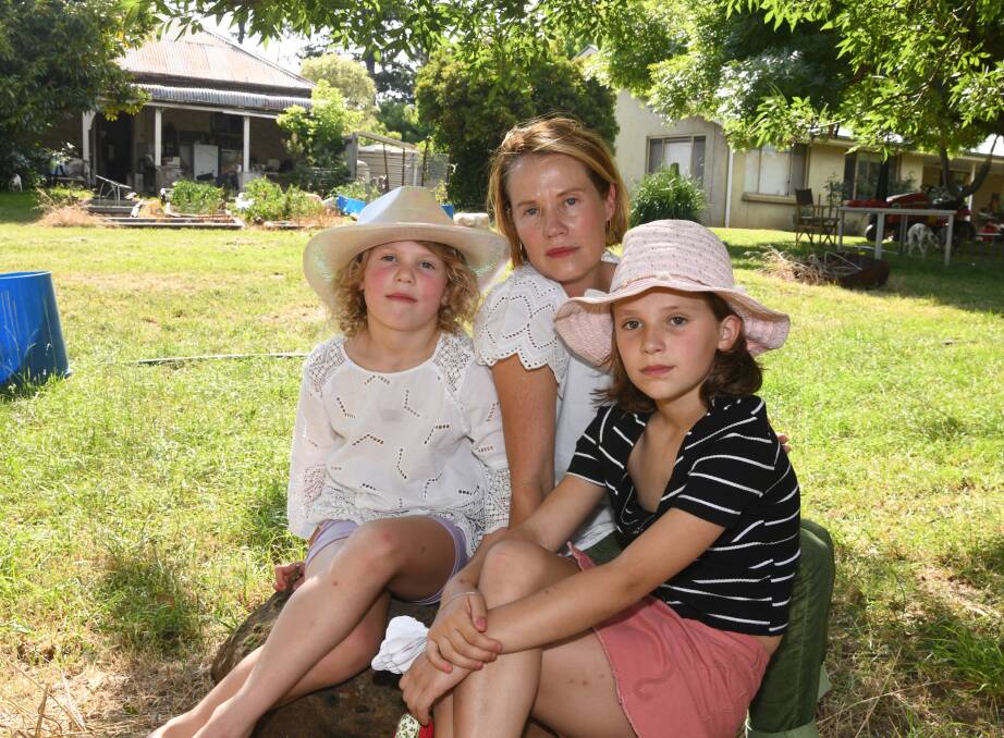 Daniel Duggan wife and children Ginger, Saffrine and Hazel at the family farm. Picture by Carla Freedman
