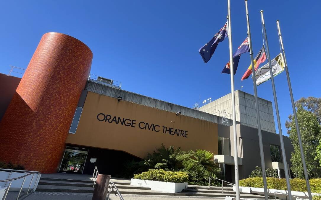 Orange City Council flags fly at half-mast on Tuesday. Picture by William Davis
