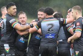 Bathurst Panthers celebrate in the rain in a match from the 2023 season. Picture by Phil Blatch