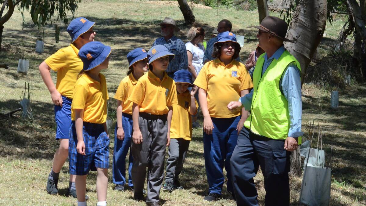 Students from Carcoar Public School checking out Pound Flat with Blayney council's Brian Parker in November 2017.