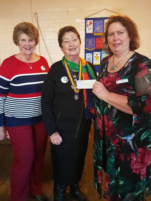 Changeover: Past President Patti Crofts and new President for 2018-2019, Lyn May, presenting a cheque to Deb Higgs, the Acting Health Services Manager.
