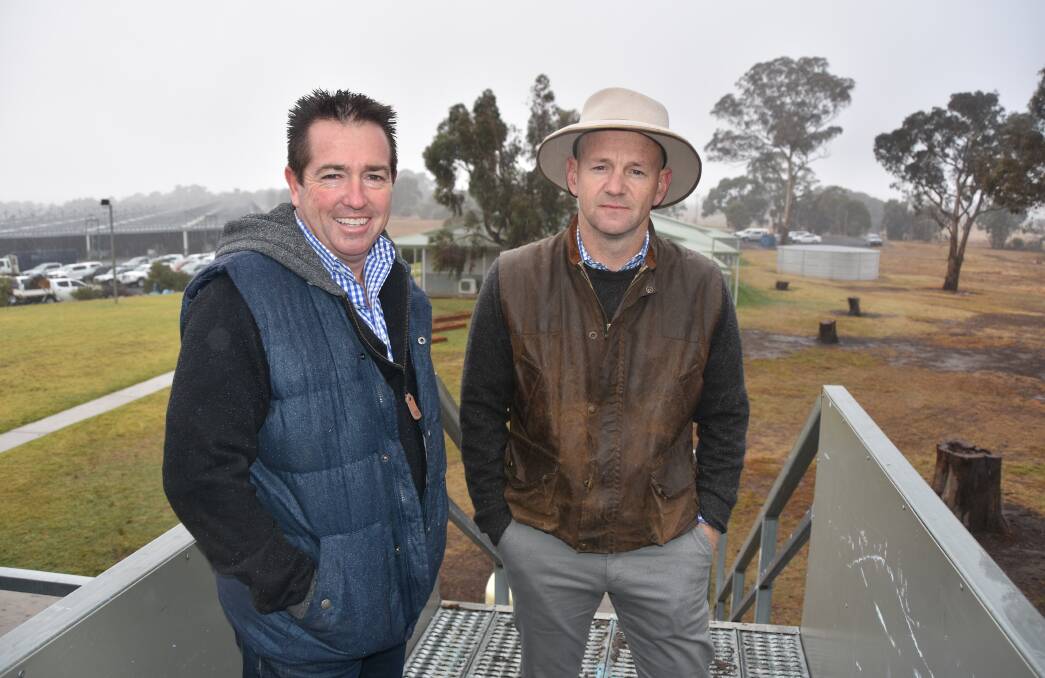 Before dashing to a meeting with farmers in Newbridge, Bathurst MP Paul Toole and Primary Industries Minister Niall Blair dropped in on the Central Tablelands Livestock Exchange on Friday.