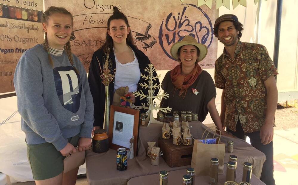 BIG DAY: Lucy Opie, Lucy Rackham, Madi Schmidt, Nathan Gatt at the Oil and Herbs Grocer and Co Organic stall at the markets. Photo: MARK LOGAN